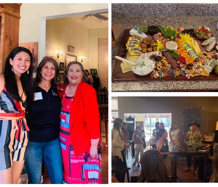 A group of women attending a networking event at a local New Braunfels business 